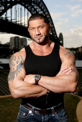 Dave Batista Dragon And Flag Tattoo On Arm